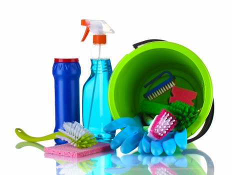 Cleaner working in a shared office kitchen in NW3