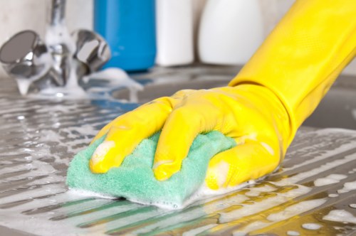 Cleaner managing hoses and cables to prevent trip hazards